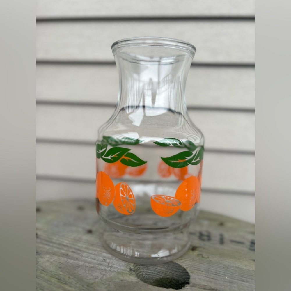 Vintage orange juice container.